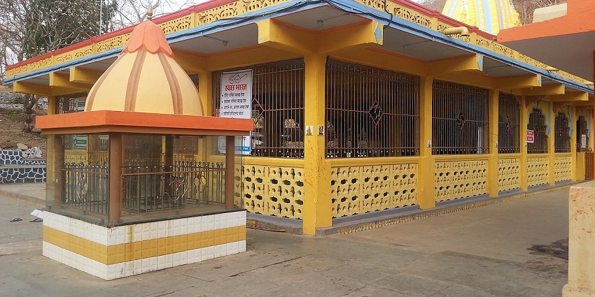View of Tungareshwar Temple with stone walls, a popular spot near Kamandurg Fort.