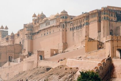 A panoramic view of a fort in India, with its massive stone walls and circular bastions.