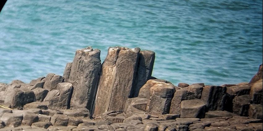 Old basalt rocks at St. Mary’s Island, a place to visit in april in Karnataka