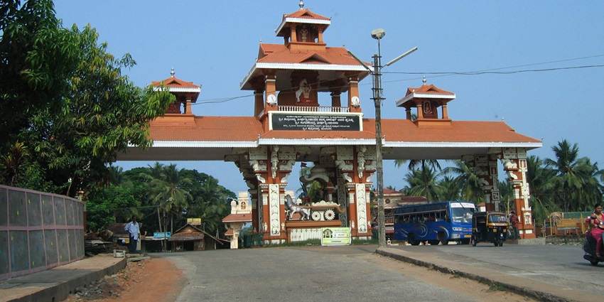 Image of the backside of the Udupi town around the main road during day time