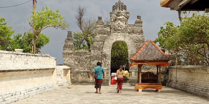 View of the magnificent Uluwatu Temple, situated atop a cliff.