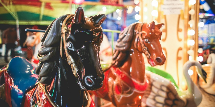 Picture of Closeup Photography of Brown and White Carousel
