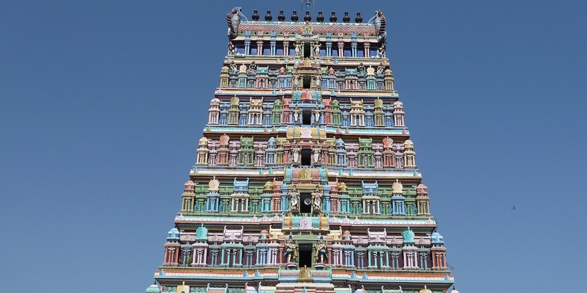 A picture of Ancient Uthirakosamangai Temple, an emerald statue-strewn temple.