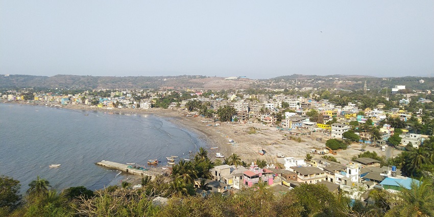 A view of fishermen's boats resting at Uttan Beach, a quiet spot near Thane