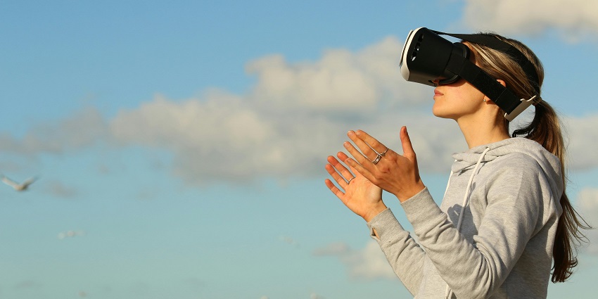 An image of VR Here VREC Studio with visitors enjoying virtual reality games.
