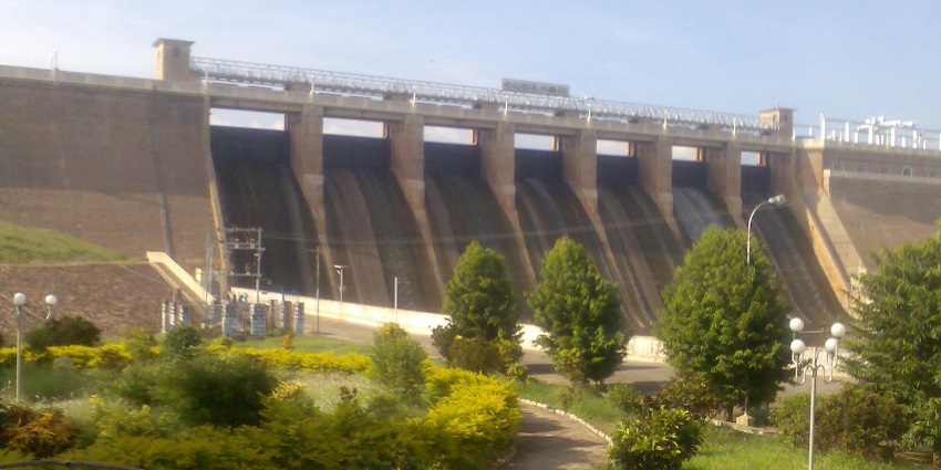 A peaceful evening view of Vaigai Dam near Kumbakarai Waterfalls.