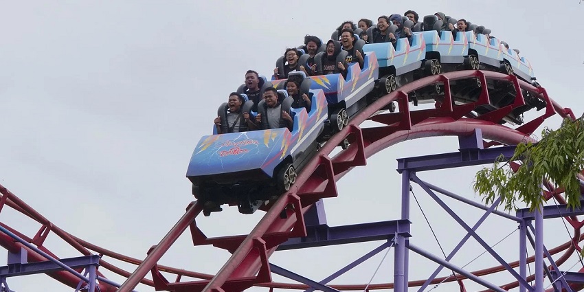 A thrilling roller coaster ride with bright yellow tracks.