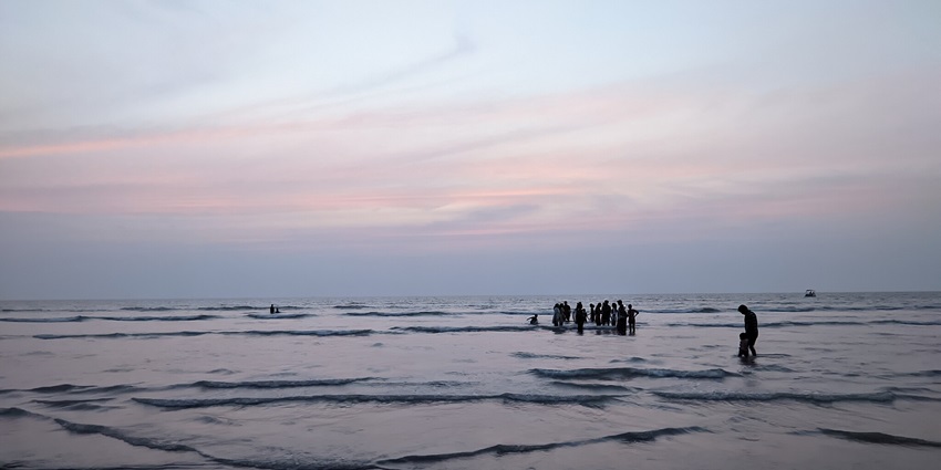 Varsoli Beach, a popular beach in Alibaug, showcasing soft sands and tranquil waters
