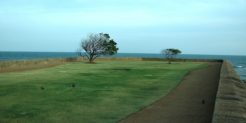 Coastal fort providing scenic views of the ocean and hills.