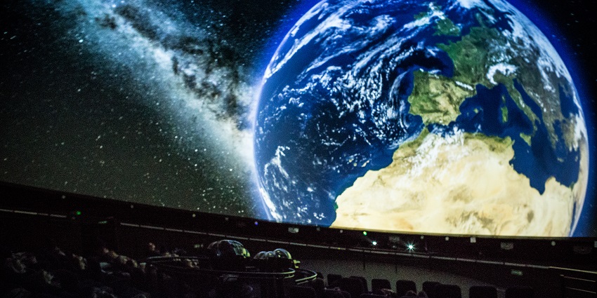 Information related to Earth provided in a movie at a planetarium.