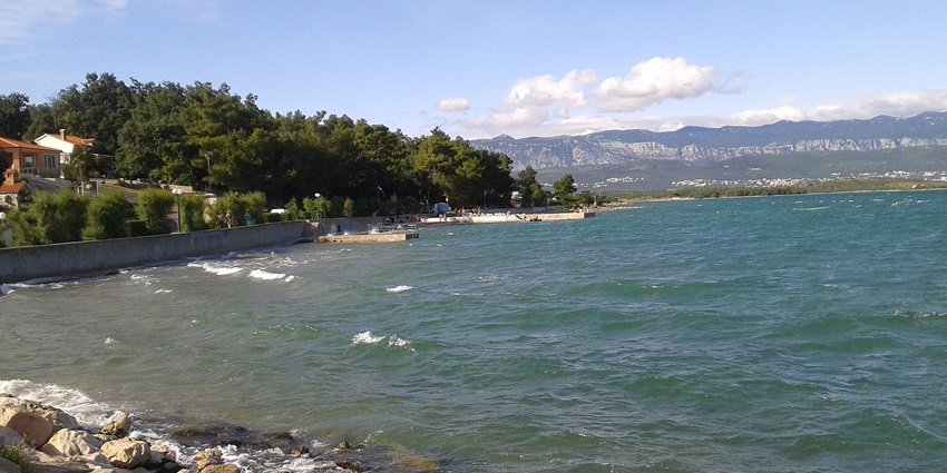 Velas Riva Beach featuring soft sand and gentle waves under a clear sky, perfect for relaxation