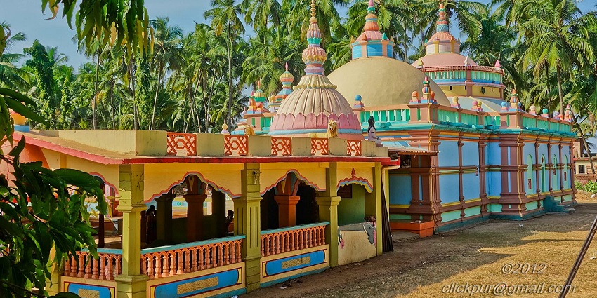 Guhagar tourist places include Lord Shiva temple with traditional architecture near Velneshwar Beach.