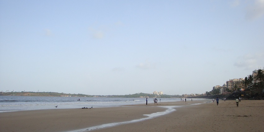 Versova Beach in Mumbai, India, featuring sandy shores and gentle waves