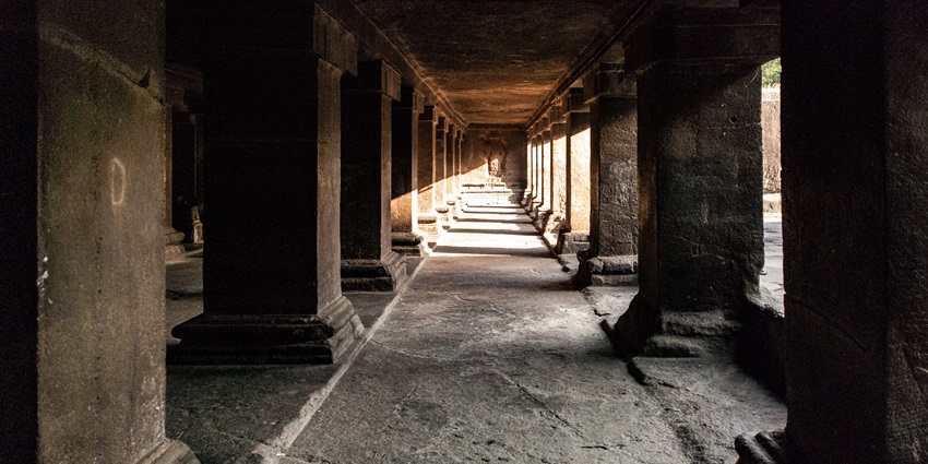 An ancient rock-cut temple dedicated to Lord Shiva with intricate carvings.