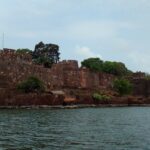 Vijaydurg Fort, a famous fort in Maharashtra, stands tall with historic stone walls.