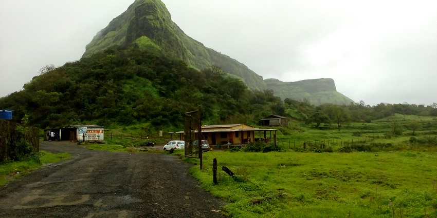 View of Visapur Fort, showcasing its stone walls and scenic surroundings in Maharashtra.