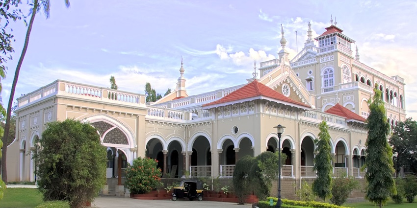 Aga Khan Palace is a historical landmark nestled within beautiful gardens in Pune.