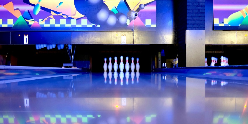 An image of colourful bowling pins lined up - one of the things to do in Marathahalli.