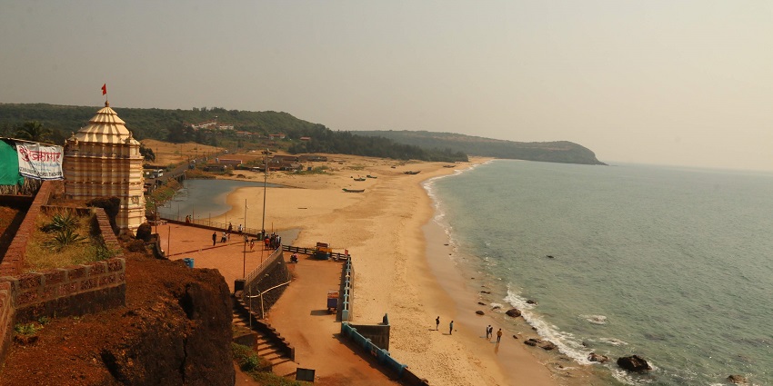 The Kunkeshwar seashore in Kokan, Maharashtra, featuring sandy beaches and Kunkeshwar temple.