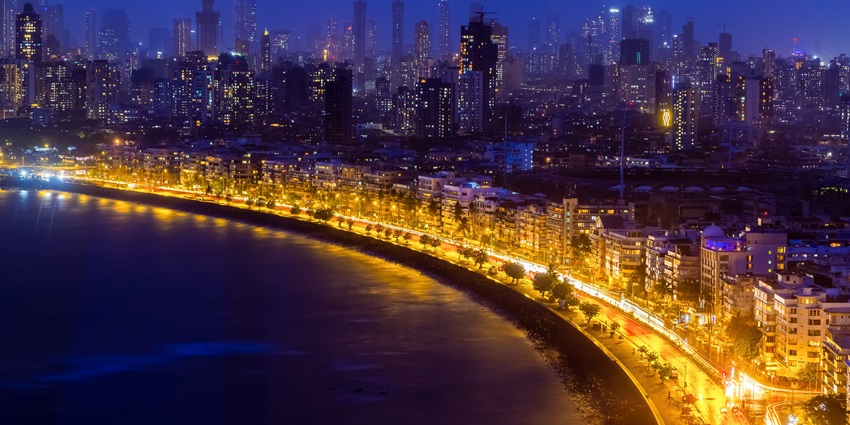 An aerial shot of the scenic Marine Drive in Mumbai taken during nighttime