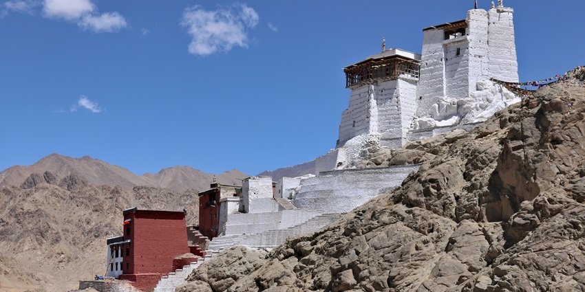 Hilltop monastery with panoramic Leh views, ancient murals, and serene spiritual ambiance above the old town.