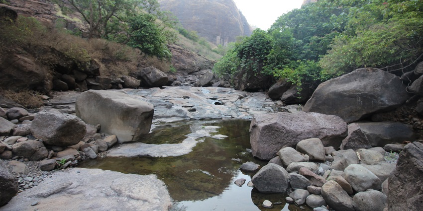 River near Bhira village showcasing rural life.