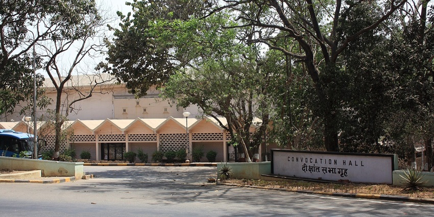 The sprawling IIT Bombay campus features open spaces and lush greenery all around.