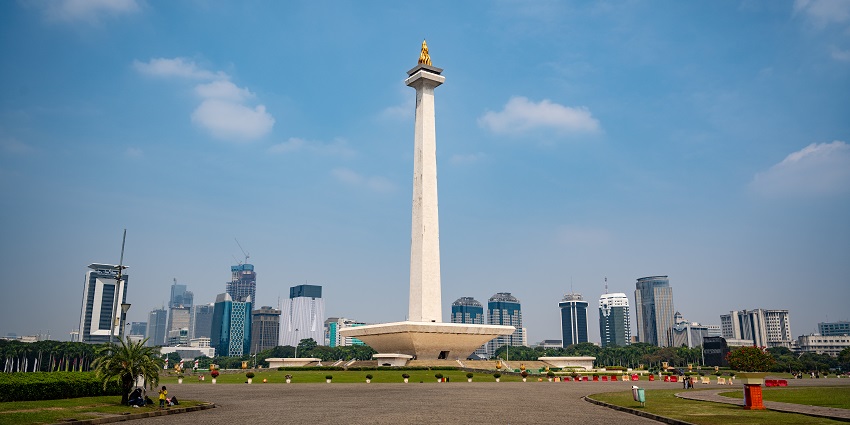 The beautiful view of the Jakarta National Monument Monas with buildings around it