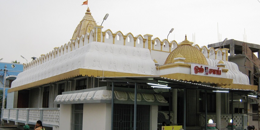 The image shows the Sai Baba Samadhi Mandir, a prominent temple dedicated to the revered Indian saint Sai Baba