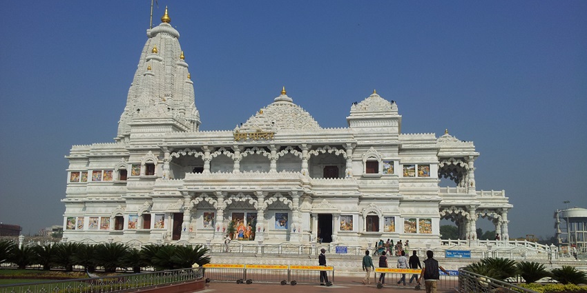 A frontal view of a temple built using white marble in traditional Hindu architecture