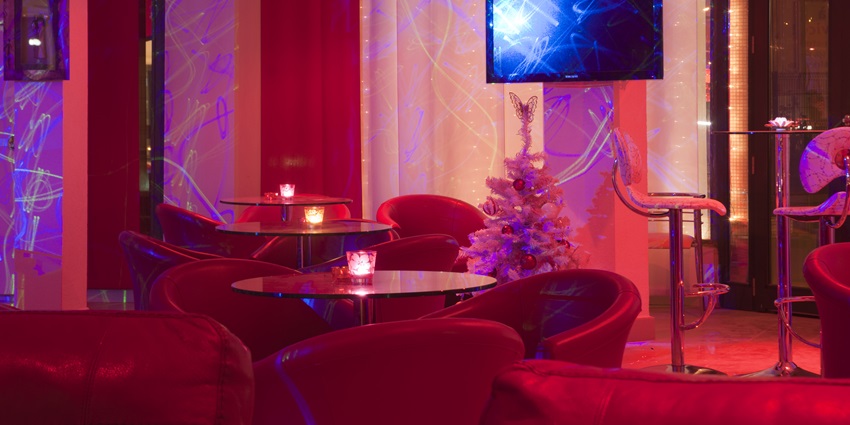 WAX Lounge & Bar offers innovative cocktails and a chic ambiance.