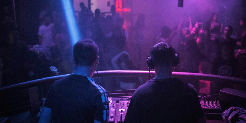 Image of two men playing music at a DJ party at WTF, Jaipur