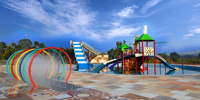 Thrilling moments as friends splash and laugh together at a vibrant water park for all.