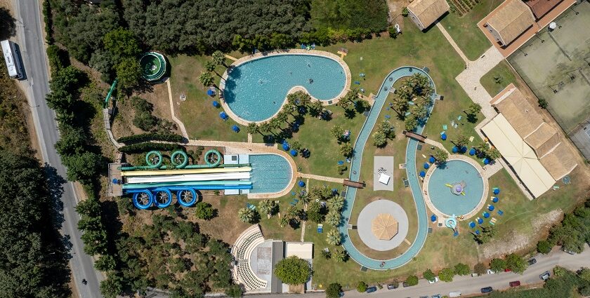 An aerial view of a famous adventure hub in Maharashtra featuring colourful rides.