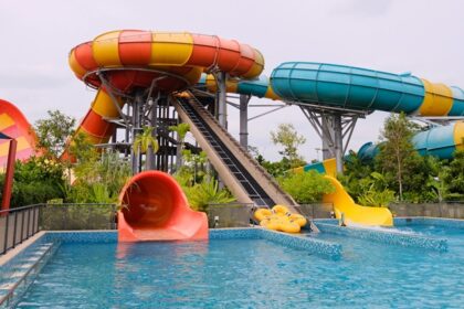 Enjoy the adrenaline rush of a water slide ride at a top water park destination in Kolhapur.