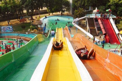 Image of families enjoying thrilling slides at a water park in Uttar Pradesh