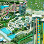 An aerial view of a leisure hub in Maharashtra decked with serene pool and rides.