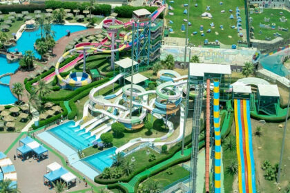 An aerial view of a leisure hub in Maharashtra decked with serene pool and rides.