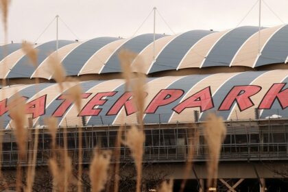 Image of a large sign written water park on a building - explore water parks in panipat