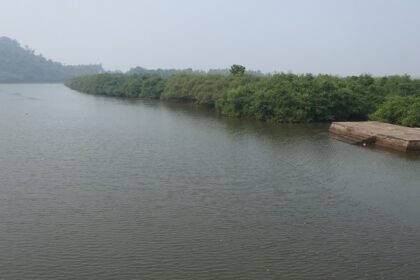 View of calm water in Malgund Creek in Ganpatipule.