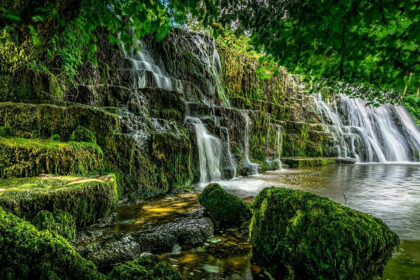 Tourists enjoying at a waterfall in Trichy with its stunning natural beauty for travellers