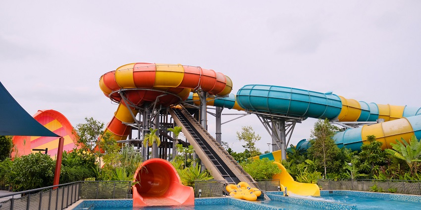 Image of thrilling rides enjoy a boat ride on a scenic river surrounded by nature