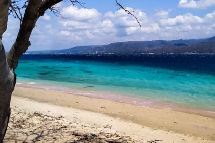 Image of contrast colours of sand and sea depth can be seen on the beach of West Bali National Park