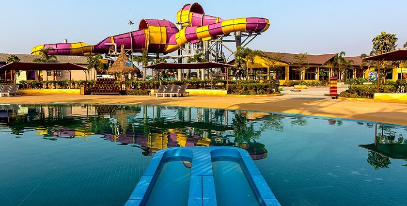 Aerial view of Wet N Joy Water Park Lonavala, featuring water slides and pools.