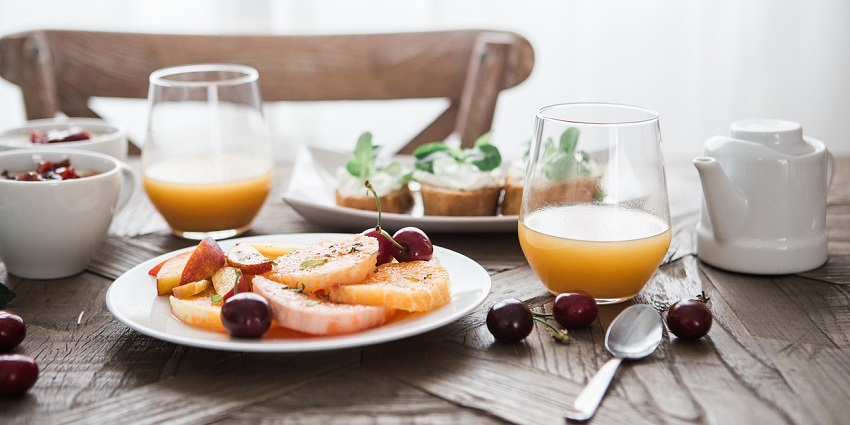 Delicious restaurant meal displayed on a table, featuring vibrant dishes and decor.