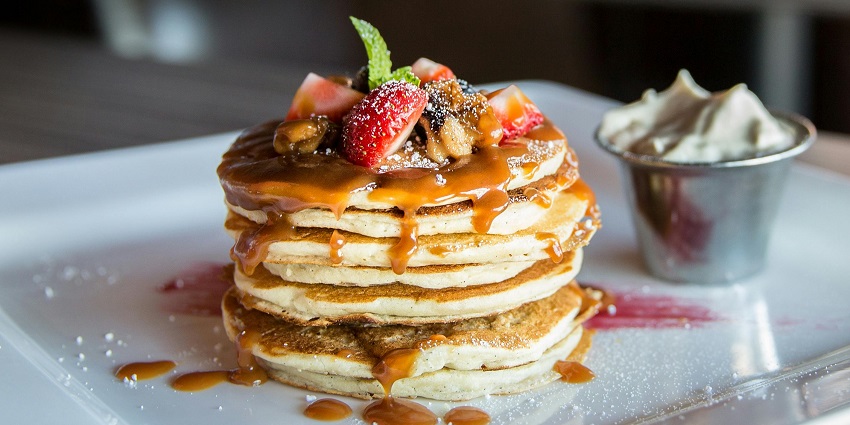 Image of the freshly cooked pancakes being served on the plater
