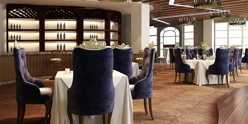 A dining setup with a white tablecloth and purple chairs, creating a vibrant atmosphere.