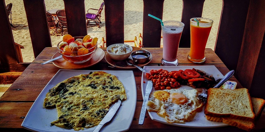 An image of a plate of Coto Makassar, a traditional dish showcasing the island's rich culinary heritage.