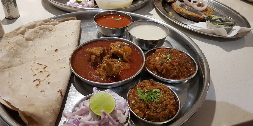 An image of the famous Maharashtrian traditional thali, a delightful local meal.