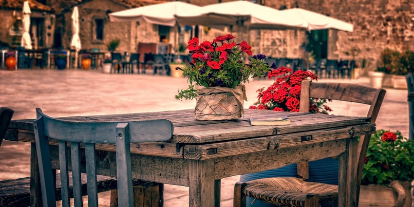 Rustic old table and chair set showcasing vintage charm and classic design.